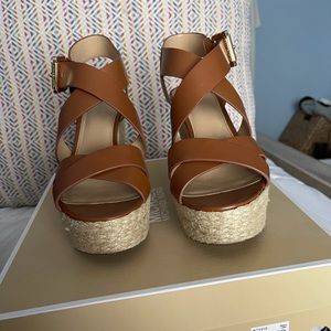 Brown Michael Kors wedges.